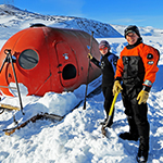 University of Oregon doctoral student Paul Cziko (right, seen here preparing for a dive) and his colleagues measured seawater temperatures for more than a decade in one of the world's coldest Antarctic fish habitats, and discovered that the ice crystals inside the fishes may never melt.