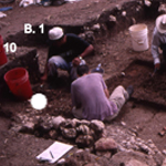 The researchers excavated two modest homes in a small Maya center called Saturday Creek, in central Belize. Numerous artifacts, including vessels, stones and human remains, were found in the floors of each dwelling.