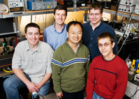 The camera was designed by John Rogers (back left), the Flory-Founder Chair Professor of Materials Science and Engineering, and his research group: (clockwise from back right) Joe Geddes, Mark Stoykovich, Heung Cho Ko and Viktor Malyarchuk, all postdoctoral researchers.