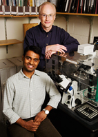 From left, graduate student Vijay Gupta and Steven Blanke, an Illinois professor of microbiology, have discovered how an H. pylori toxin gets into cells.