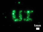 Magnified optical image produced by a proof-of-principle copper nanowire-based field-emission display activated in a vacuum-sealed chamber.