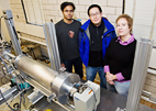 A multidisciplinary team - graduate student Abhijit Mishra, left; materials science and engineering professor Gerard Wong; and postdoctoral researcher Vernita Gordon - has solved the mystery of how stealthy HIV protein gets into cells. They are standing next to a small angle X-ray spectrometer. Their findings could improve the design of therapeutic agents that cross a variety of membrane types.