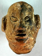 Clay figurine, human head
