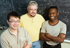 Scientists at the University of Illinois have discovered a new particle hidden in copper-oxide ceramics (cuprates). From left are physics graduate student Ting-Pong Choy, and physics professors Robert G. Leigh and Philip Phillips.