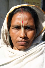 Scorned Hindu widows, such as this woman in Vrindivan, are sometimes turned out of their homes and have few economic options other than begging for an ashram.