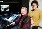 Betsy Kruger, right, is the coordinator for digital content creation at the U. of I. Library.Tim Cole, the mathematics librarian and interim head of digital services at the Library, has overseen the development of Illinois Harvest.