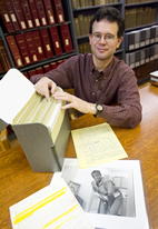 U. of I. assistant archivist Christopher Prom with some of the materials of the Dash papers: (from foreground to background) transcript of part of the interview with Rosa Lee from his Pulitzer-winning project, a photo of Lee taken by Washington Post photographer Lucian Perkins, and notes taken of Lee's criminal record in 1988 at the Washington, D.C., jail.