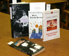 A few of the rare titles of poetry, fiction, non-fiction and journals that prolific writer and radio essayist Andrei Codrescu gave the U. of I. Library are shown. Most of the materials are in Romanian and many are rare and were produced by small publishing houses.