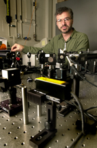 Using a technique called time-domain thermoreflectance, graduate student Ruxandra Costescu is measuring the thermal conductivity of the thin-film nanolaminates synthesized in the University of Illinois at Urbana-Champaign laboratory of David Cahill, professor of materials science and engineering.