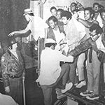 Sign of the times Social unrest was evident in most corners of university life in the late 1960s, as controversy over the Vietnam War collided with racial tensions and riots at the Democratic Convention in Chicago. Here, African-American students brought in as part of a university integration initiative were arrested after protesting at the Illini Union after hours and causing minor property damage. In all, 248 students were arrested.