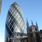 Nicknamed “the Gherkin,” London’s 591-foot-tall 30 St Mary Axe (previously named the Swiss Re Building) is an example of an iconic, aerodynamic form, but it has been criticized for its lack of connection to the historic context of its surroundings.
