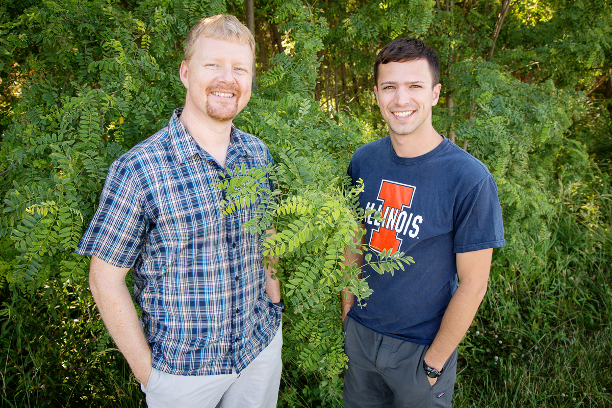 Researchers at the U. of I. found that plants vary a lot in the efficiency with which they uptake carbon dioxide and conserve water. Plant biology professor Andrew Leakey, left, mentored Kevin Wolz, who was an undergraduate at the time he conducted the research. Wolz now holds degrees in civil engineering and biology and is pursuing a doctorate in biology.