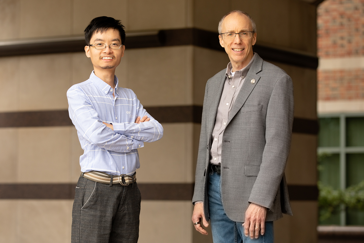 Photo of researchers Yun Liu and Jeffrey Moore