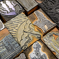 Photo of blocks with various graphics for use in a letterpress.