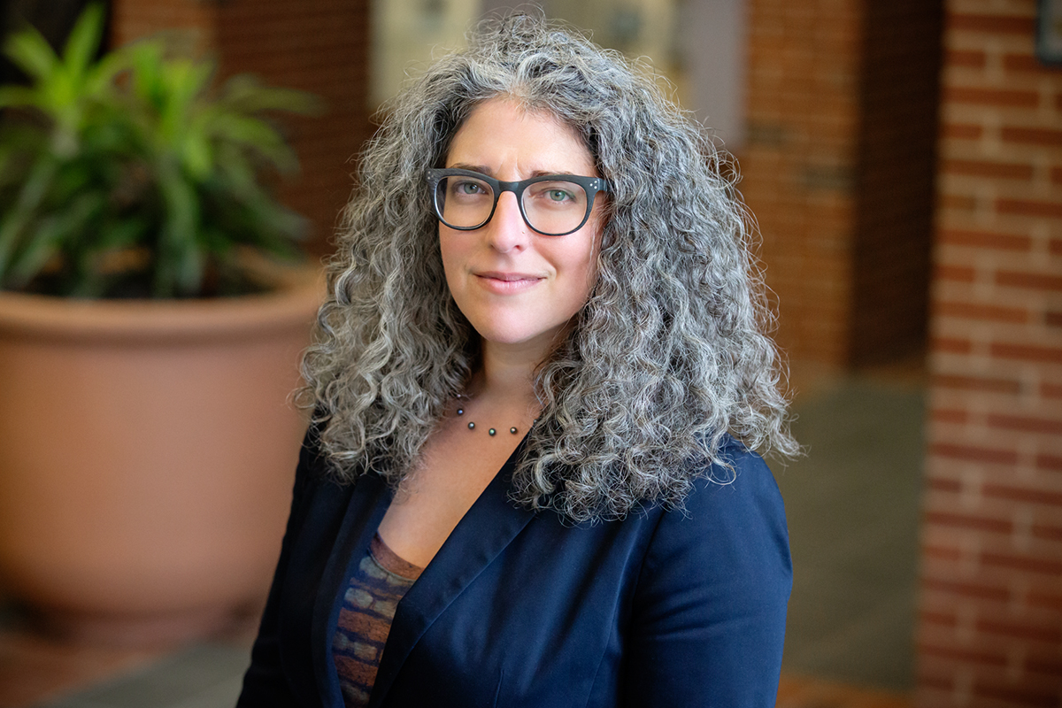 Photo of Lauren R. Aronson, an associate clinical professor of law and the director of the Immigration Law Clinic at the U. of I. College of Law.
