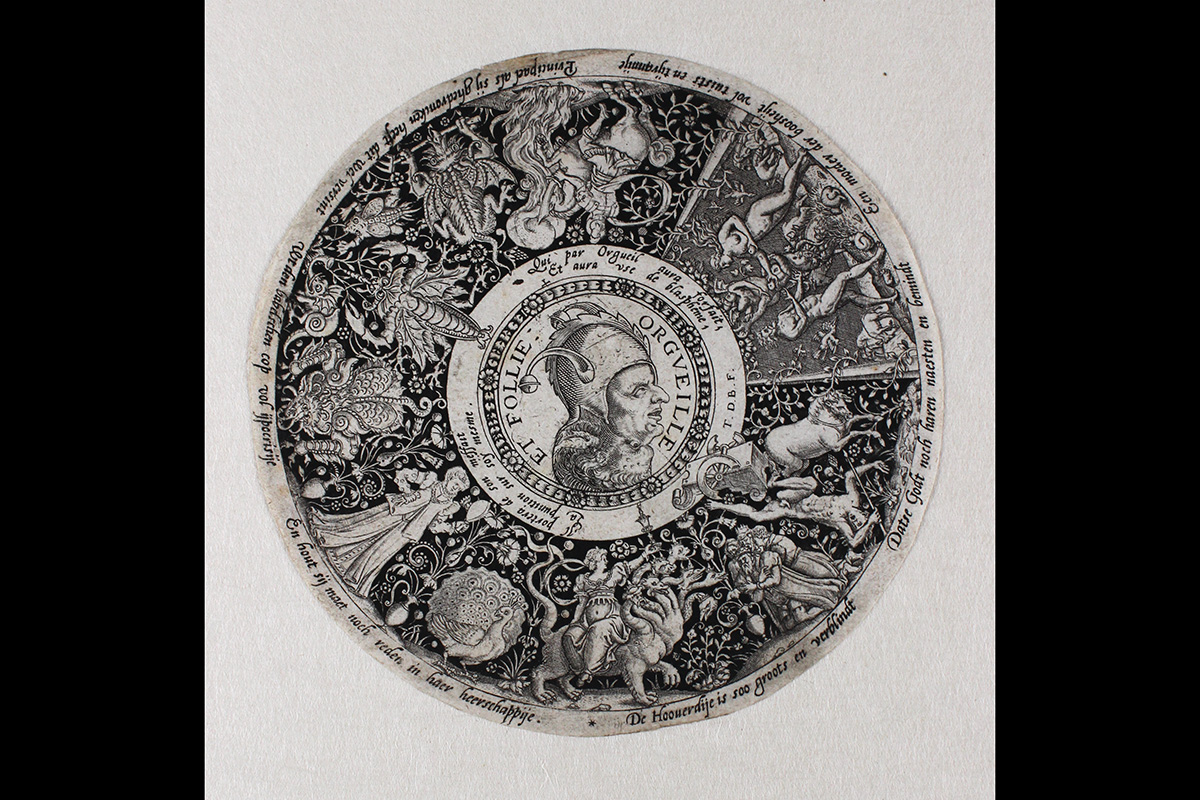 Print of a medallion with various people and animals circling the center image of a man’s head wearing a jester’s hat.