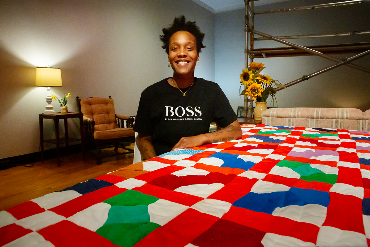 Blair Ebony Smith with her quilt