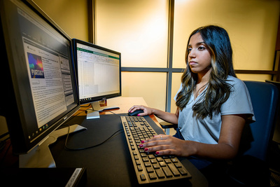 The Cline Center for Advanced Social Research and an interdisciplinary team of University of Illinois Urbana-Champaign experts have developed a statewide registry on the use of lethal force by police officers in Illinois. U. of I. student Sruthi Navneetha, part of SPOTLITE’s student research team, compiles data and scans news articles for police uses of lethal force.