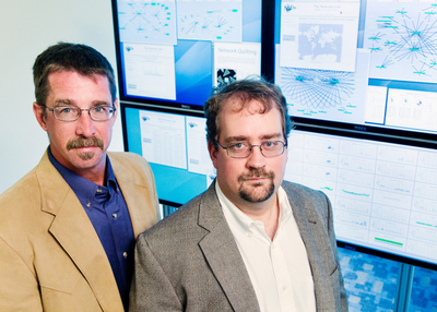 Randy Butler (left) and Von Welch, the co-directors of the Cybersecurity Directorate at the U. of I.'s National Center for Supercomputing Applications, work with law-enforcement agencies in investigating crimes that occur in cyberspace.