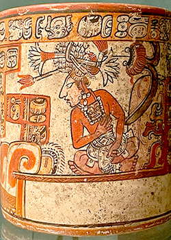 Photograph of Maya vessel with depiction of a king wearing a water lily headdress.