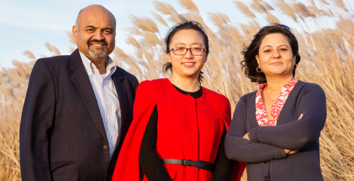 Illinois researchers used a land-surface model to determine regions in the United States where bioenergy crops would grow best. L-R: Atmospheric sciences professor Atul Jain, graduate student Yang Song, and agricultural and consumer economics professor Madhu Khanna.