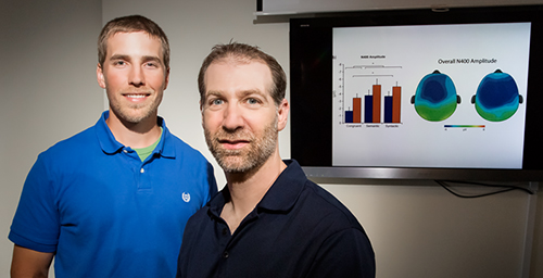University of Illinois kinesiology and community health professor Charles Hillman, right, and graduate student Mark Scudder looked at electrical activity in the brain to help explain why fitness is associated with better language skills in children.