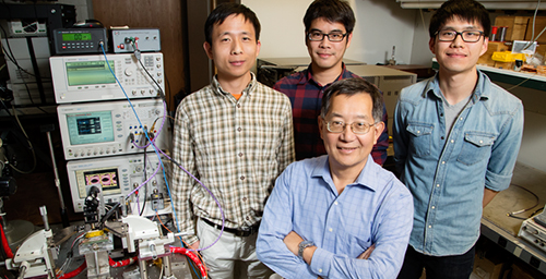University of Illinois engineers  -  from left, postdoctoral researcher  Fei Tan, graduate students Mong-Kai Wu  and Michael Liu, led by Milton Feng, front - developed a laser that can transmit data at a blazing fast 40 gigabits per second, without errors - the fastest in the U.S.