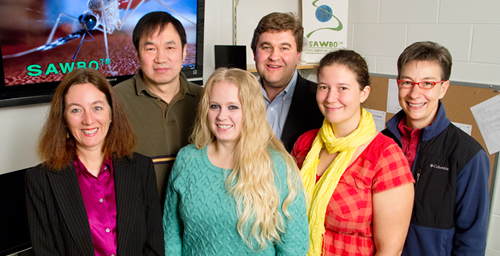 University of Illinois entomology professor Barry Pittendrigh (back right) and his colleagues create animated educational videos as part of the Scientific Animations Without Borders project. Pictured: back row left: entomology research scientist Weilin Sun; front row from left: SAWBO co-founder Julia Bello-Bravo, who also is assistant director of Illinois Strategic International Partnerships; graduate students Laura Steele and Alice Vossbrinck; and research specialist Susan Balfe.