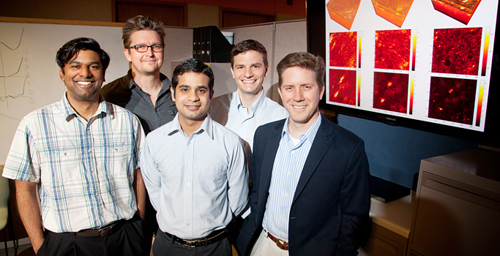 University of Illinois engineers developed a method to computationally correct aberrations in three-dimensional tissue microscopy. From left, postdoctoral researcher Steven Adie, professor P. Scott Carney, graduate students Adeel Ahmad and Benedikt Graf, and professor Stephen Boppart.