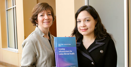The unmet health care needs of Latinos in the U.S. and strategies for addressing the linguistic and other barriers that impede them are examined by a panel of experts in a new book, "Creating Infrastructures for Latino Mental Health," co-edited by Lydia Buki, left, a professor in the department of kinesiology and community health, and Lissette Piedra, a faculty member in the School of Social Work.