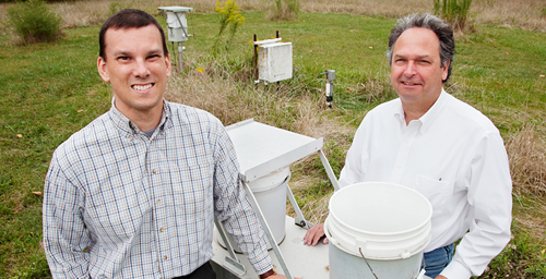 Researchers Christopher Lehmann, left, and David Gay completed a 25-year study of acidic pollutants in rainwater collected across the U.S. and found that both frequency and concentration of acid rainfall has decreased.
