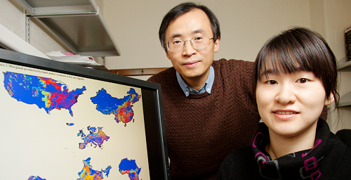 Civil and environmental engineering professor Ximing Cai, left, and graduate student Xiao Zhang performed a global analysis of marginal land that could produce biofuel crops.