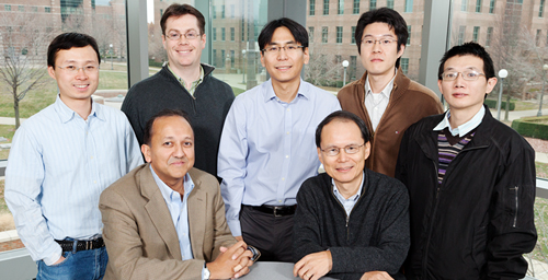 A team University of Illinois researchers led by electrical and computer engineering and bioengineering professor Rashid Bashir (bottom left) have developed an array of microsensors to measure the relationship between cell mass and growth rate.