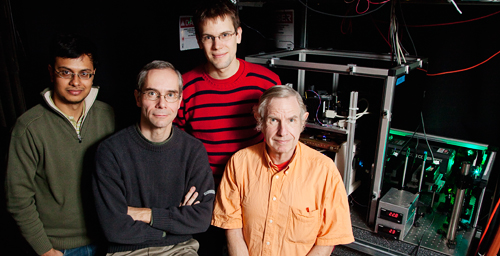 A new technique to study protein dynamics in living cells has been created by a team of University of Illinois scientists, from left, graduate student Apratim Dhar; Martin Gruebele, professor of chemistry; Simon Ebbinghaus, postdoctoral researcher; and J. Douglas McDonald, professor of chemistry.