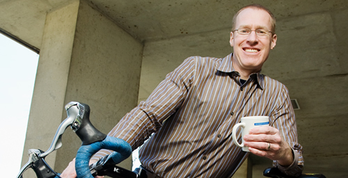 Former competitive cyclist Robert Motl, now a professor of kinesiology and community health, is studying the effects of caffeine on pain during exercise.