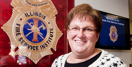 Administrative assistant Terri Hopper has worked with the Illinois Fire Service Institute for 12 years, a place where fellow employees "support you in good times and bad." Some of Hoppers human resources responsibilities have her helping all of the institute's 600 employees.  Click photo to enlarge