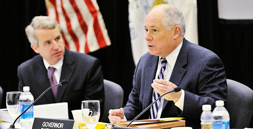 Board chair Christopher Kennedy, left, and Gov. Pat Quinn at the Jan. 20 UI Board of Trustees meeting at UIC. The governor introduced two new trustees.  Click photo to enlarge