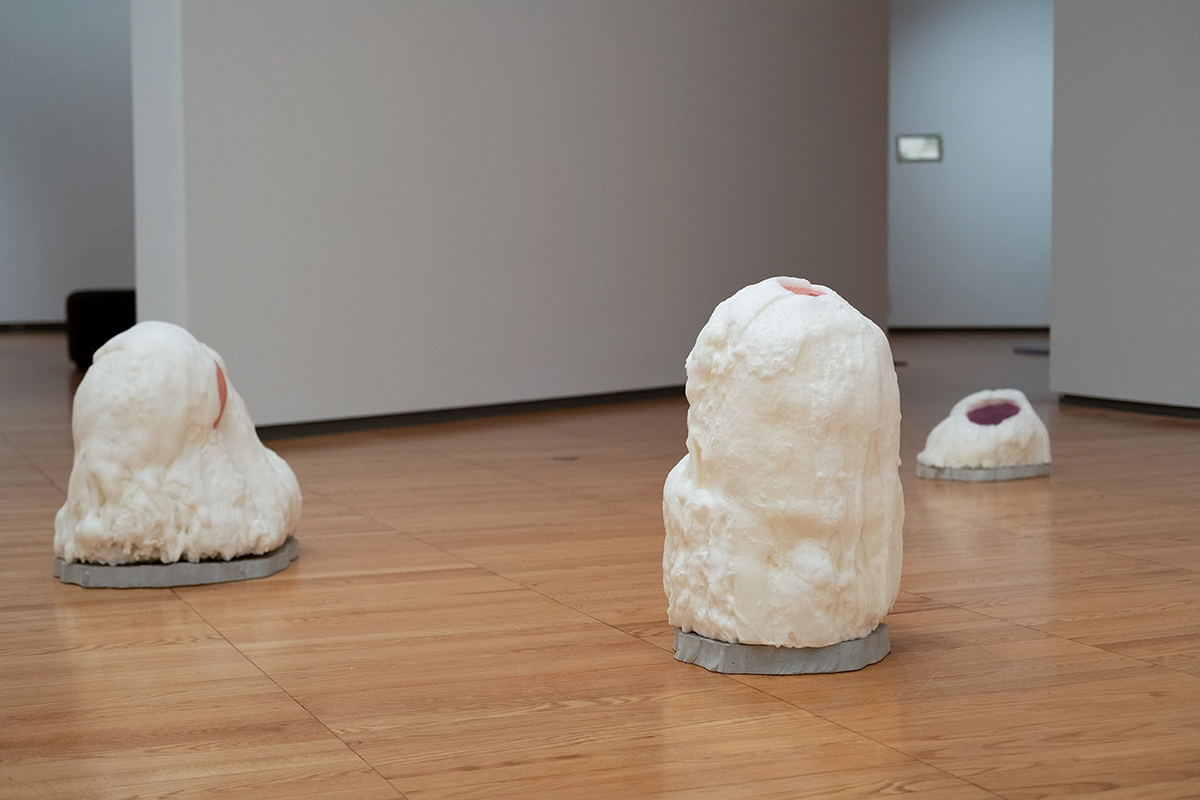 Image of foam sculptures sitting on a gallery floor.
