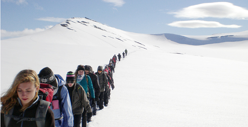 Class crosses Larsbreen Glacier in Svalbard, Norway.