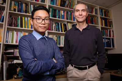 A portrait of University of Illinois, Urbana-Champaign researchers Martin Gruebele, right, and graduate student Huy Nguyen.