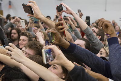 Phone cameras in action at the Bernie Sanders campaign event on March 12 at the University of Illinois.