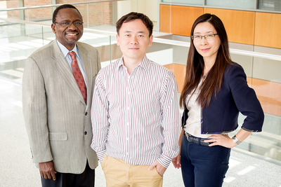 Illinois researchers developed a method to etch tall, thin transistors for high performance with less error. Pictured, from left: professor Ilesanmi Adesida, graduate student Yi Song and professor Xiuling Li.