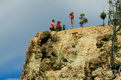 Students learned about the politics and other issues surrounding the national parks through an on-site course this June in the Greater Yellowstone area. One day's "sampler" hike gave students a chance to witness several examples of unwise behavior, including these tourists hanging out on the edge of the Grand Canyon of the Yellowstone.