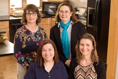 A new study explored Latinas’ attitudes toward lay community health researchers called “promotoras.” Co-authors on the paper were, from left front, Jennifer McCaffrey, assistant dean of family and consumer sciences; kinesiology and community health professor Andiara Schwingel; applied family studies professor Angela R. Wiley, and nutritional sciences professor Dr. Margarita Teran-Garcia.