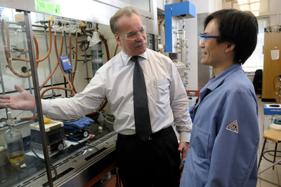 Illinois chemistry professor Scott E. Denmark, left, with former graduate student Timothy Cheng. Denmark was elected to the American Academy of Arts and Sciences.