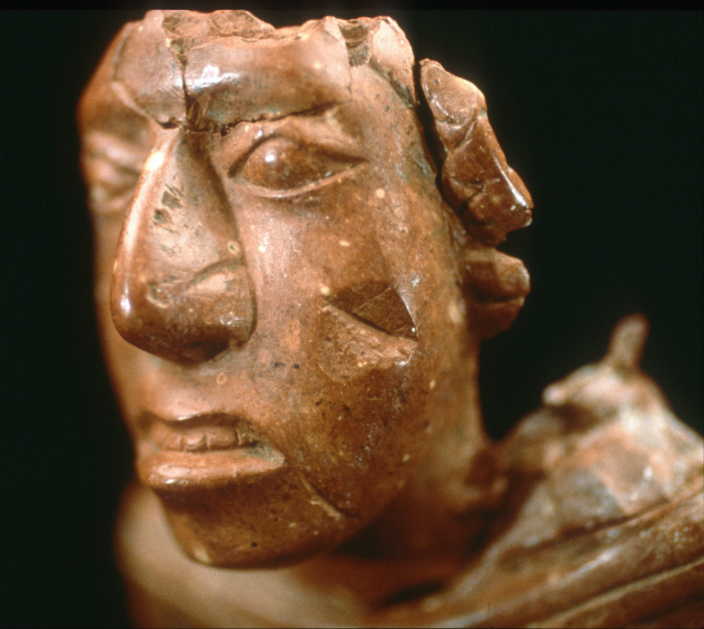 Face of an ancient female figurine.