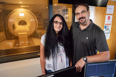 University of Illinois psychology professors Sanda Dolcos, left, and Florin Dolcos found that focusing on the contextual details of a triggered negative memory could help redirect focus to the task at hand.
