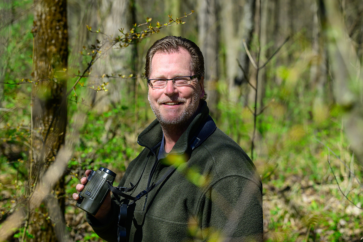 Photo of Jeff Hoover in the woods.