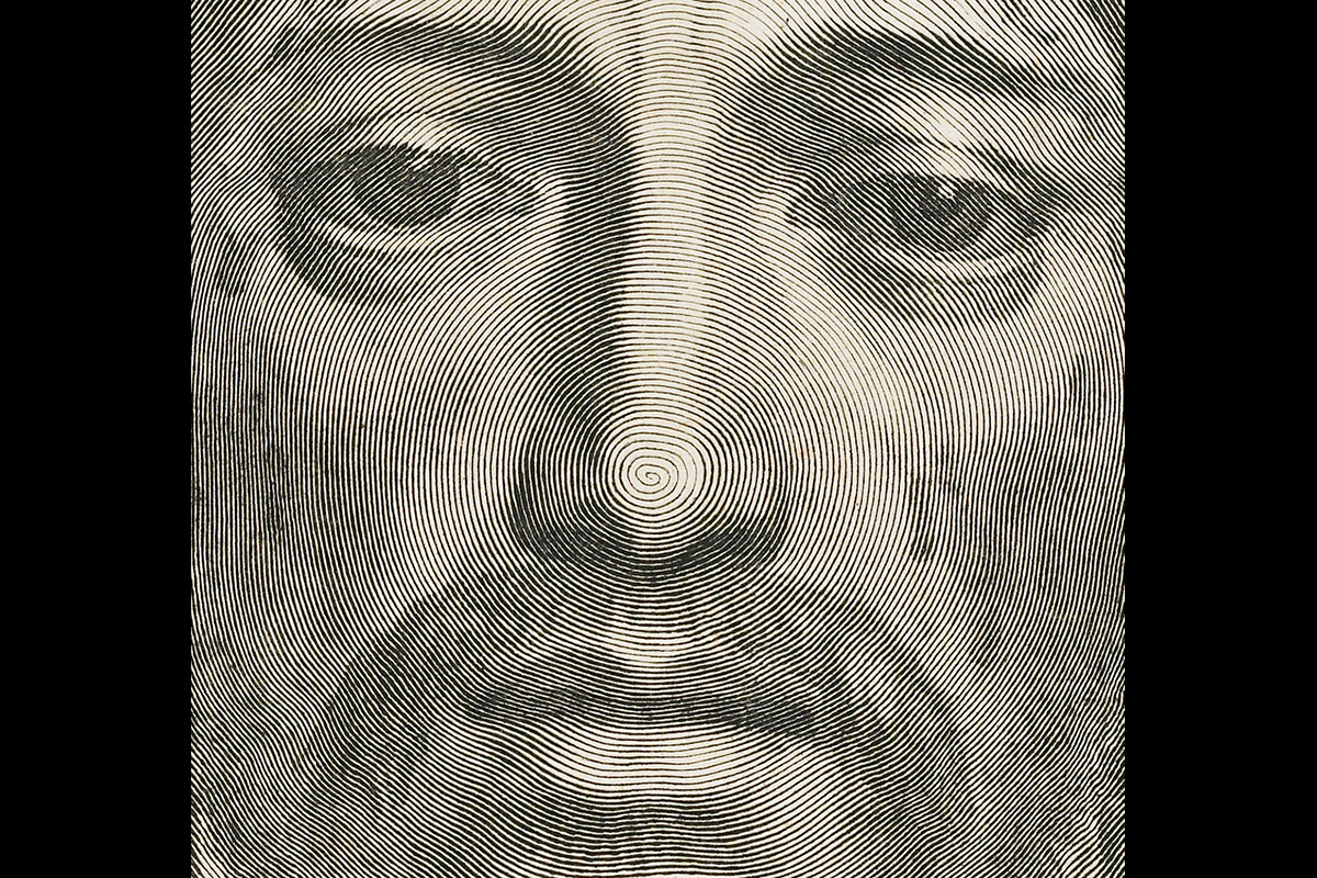 Detail of a print by Claude Mellan depicting the face of Christ, made with one continuous line spiraling out from the nose.