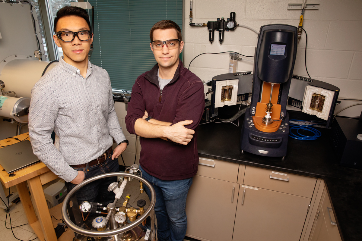 Materials science and engineering professor Christopher Evans, right, and graduate student Brian Jing have developed a solid battery electrolyte that is both self-healing and recyclable.
